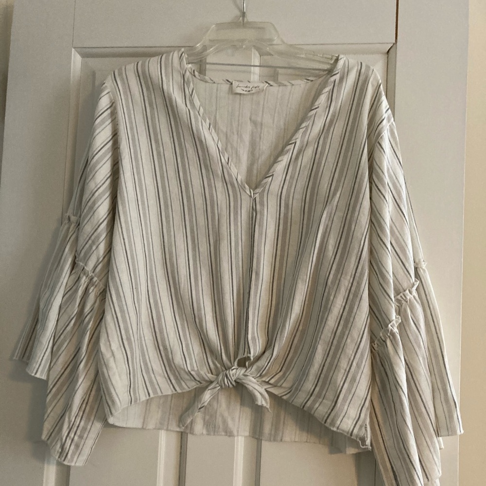Ruffle sleeve tie front cotton blouse